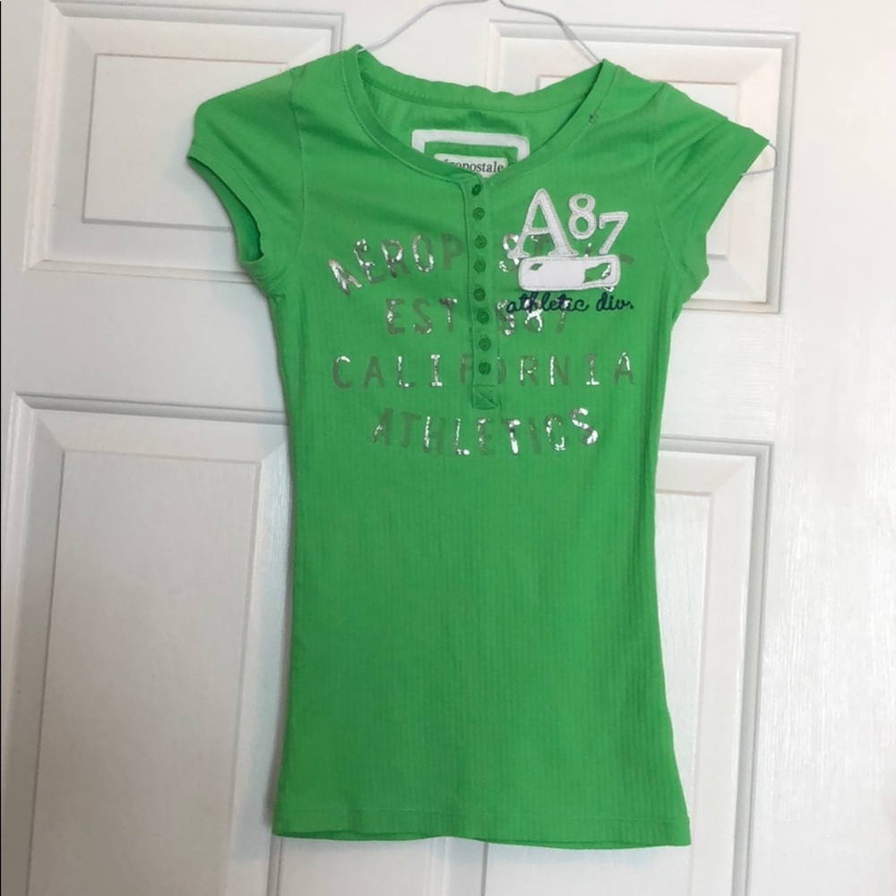 Green tee, never worn.